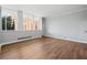 Spacious living room with hardwood floors and large windows at 3060 Pharr Court North Nw # 317, Atlanta, GA 30305