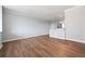 Spacious living room featuring hardwood floors and neutral walls at 3060 Pharr Court North Nw # 317, Atlanta, GA 30305