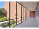 Covered balcony overlooking a courtyard and neighboring building at 3060 Pharr Court North Nw # 317, Atlanta, GA 30305