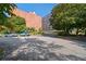 Building exterior showcasing parking area and landscaping at 3060 Pharr Court North Nw # 317, Atlanta, GA 30305