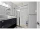Updated bathroom with marble shower and modern vanity at 3060 Pharr Court North Nw # 317, Atlanta, GA 30305