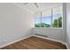 Bright bedroom with large windows and wood-look flooring at 3060 Pharr Court North Nw # 317, Atlanta, GA 30305