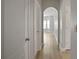 Hallway with archways and hardwood floors at 146 Elmsdale Ln, Atlanta, GA 30213