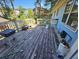 Wooden deck with grill and surrounding trees at 2598 Canon Sw Dr, Marietta, GA 30064