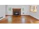 Living room with hardwood floors, fireplace and access to backyard at 2478 Woodacres Ne Rd, Atlanta, GA 30345