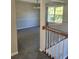 Bright dining room with large windows and neutral decor at 15 Lumby Ln, Covington, GA 30016