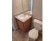 Small bathroom with toilet and vanity at 15 Lumby Ln, Covington, GA 30016