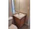 Small bathroom with single vanity sink and toilet at 15 Lumby Ln, Covington, GA 30016