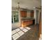Eat-in kitchen with oak cabinets and tile floor at 15 Lumby Ln, Covington, GA 30016