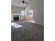Living room with fireplace and access to sunroom at 15 Lumby Ln, Covington, GA 30016