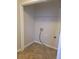 Simple laundry room with shelving and gas hookup at 15 Lumby Ln, Covington, GA 30016