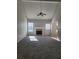 Spacious living room featuring a fireplace and vaulted ceiling at 15 Lumby Ln, Covington, GA 30016