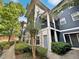 Three-story building with blue siding and stone accents at 1575 Ridenour Nw Pkwy # 804, Kennesaw, GA 30152