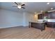 Open living room with hardwood floors and ceiling fan at 6198 Ripple Way # 87, South Fulton, GA 30349