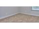 Empty bedroom with neutral walls and carpeted floors at 6198 Ripple Way # 87, South Fulton, GA 30349