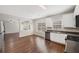 Eat-in kitchen with stainless steel appliances and hardwood floors at 4970 Wewatta Sw St, Atlanta, GA 30331