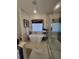 Luxurious bathroom with soaking tub, large walk-in shower, and marble floors at 727 Cascade Sw Ave, Atlanta, GA 30310