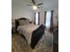 Spacious bedroom with a comfortable bed, ceiling fan and plenty of natural light at 727 Cascade Sw Ave, Atlanta, GA 30310