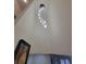 Stunning chandelier with multiple lights hanging from a high ceiling at 727 Cascade Sw Ave, Atlanta, GA 30310