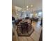 Open concept dining room with hardwood floors and a view of the living room and kitchen at 727 Cascade Sw Ave, Atlanta, GA 30310