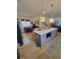 Modern kitchen with gray cabinetry, white countertops, and a large island at 727 Cascade Sw Ave, Atlanta, GA 30310