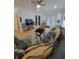 Spacious living room with hardwood floors, sectional sofa, and French doors leading outside at 727 Cascade Sw Ave, Atlanta, GA 30310