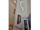 Elegant staircase with a unique railing design and a modern light fixture above at 727 Cascade Sw Ave, Atlanta, GA 30310
