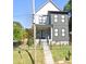 Modern two-story house with gray siding and black accents at 727 Cascade Sw Ave, Atlanta, GA 30310