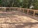 Large wooden deck overlooking a wooded area at 221 Larkshyre Trl, Lawrenceville, GA 30043
