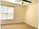 Bedroom with ceiling fan and window blinds at 221 Larkshyre Trl, Lawrenceville, GA 30043