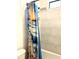 Clean bathroom with a shower/tub combo and a beach-themed shower curtain at 221 Larkshyre Trl, Lawrenceville, GA 30043
