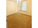 Bedroom with neutral carpeting and double doors at 221 Larkshyre Trl, Lawrenceville, GA 30043