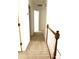 Upstairs hallway with carpet and railing at 221 Larkshyre Trl, Lawrenceville, GA 30043