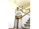 Elegant two-story entryway with a grand staircase at 221 Larkshyre Trl, Lawrenceville, GA 30043