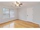 Bright bedroom with hardwood floors and a window at 2989 Wynhaven Oaks Way, Lawrenceville, GA 30043