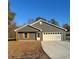 Gray house with white garage door and wooden posts at 3486 Pine Log Ne Rd, Rydal, GA 30171