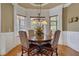 Charming breakfast nook with a round table and built-in seating at 2145 Jones Phillips Rd, Dacula, GA 30019