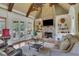 Living area features a stunning stone fireplace and high ceilings at 2145 Jones Phillips Rd, Dacula, GA 30019