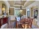 Elegant dining room with a large table and hardwood floors at 2145 Jones Phillips Rd, Dacula, GA 30019