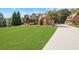 Brick house with large lawn and detached garage at 2145 Jones Phillips Rd, Dacula, GA 30019