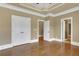Spacious bedroom with hardwood floors and ample closet space at 2145 Jones Phillips Rd, Dacula, GA 30019
