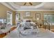 Spacious bedroom with a comfortable seating area at 2145 Jones Phillips Rd, Dacula, GA 30019