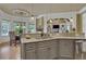 Spacious kitchen featuring granite countertops, stainless steel appliances, and an island at 2145 Jones Phillips Rd, Dacula, GA 30019