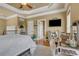 Main bedroom with a vanity and large windows at 2145 Jones Phillips Rd, Dacula, GA 30019