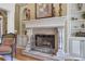 Elegant fireplace with ornate mantel and built-in shelving at 2145 Jones Phillips Rd, Dacula, GA 30019