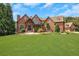 Brick house with stone accents and landscaping at 2145 Jones Phillips Rd, Dacula, GA 30019
