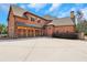 Three-car attached garage with additional storage space at 2145 Jones Phillips Rd, Dacula, GA 30019