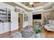 Inviting media room featuring built-in shelving and a cozy seating area at 2145 Jones Phillips Rd, Dacula, GA 30019