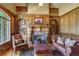 Spacious library with built-in shelves and fireplace at 2145 Jones Phillips Rd, Dacula, GA 30019