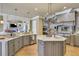 Large kitchen with a large island and high-end finishes at 2145 Jones Phillips Rd, Dacula, GA 30019